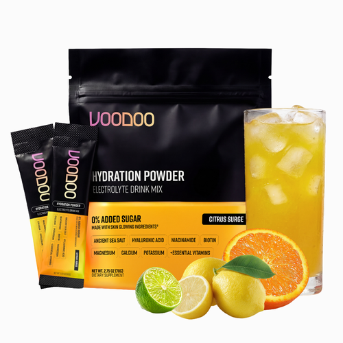 Voodoo Hydration Powder with citrus fruits on a white background