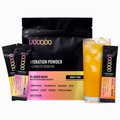 Voodoo Hydration Powder packaging with a glass of iced drink on a white background