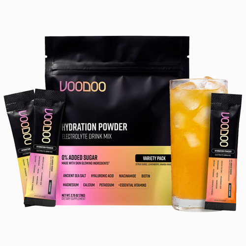 Voodoo Hydration Powder packaging with a glass of iced drink on a white background